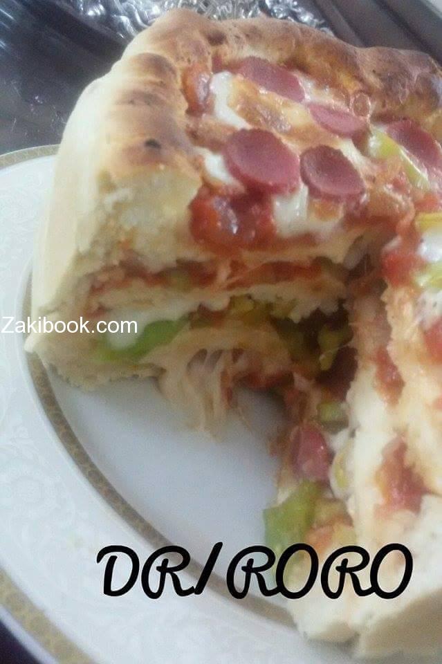 بيتزا الكيك طبقات من الجبن السايح مع طبقات من الخبز