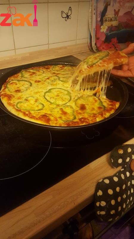 أروع و ألذ و أفخم و أشهى بيتزااااا ولا في أزكى من هيك