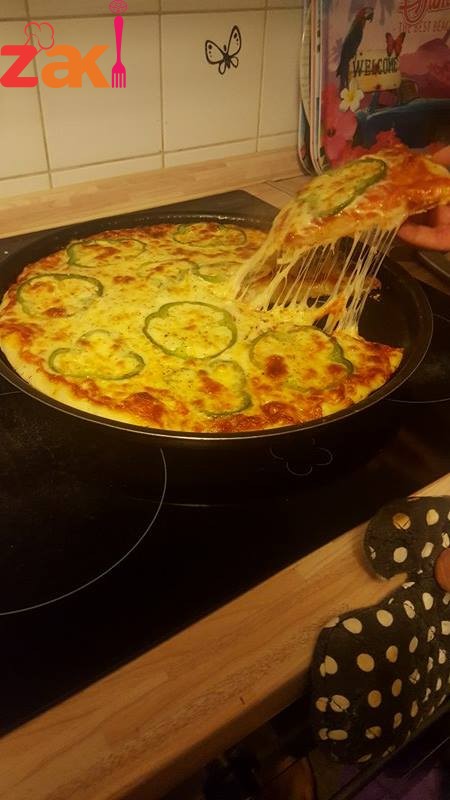 أروع و ألذ و أفخم و أشهى بيتزااااا ولا في أزكى من هيك