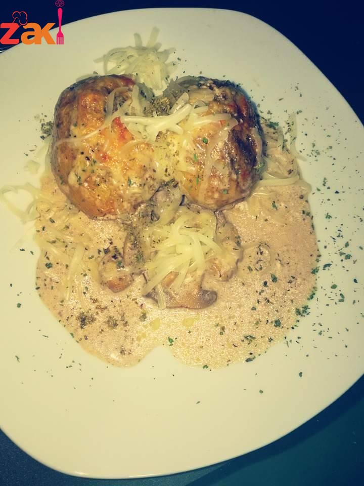 بطاطا محشية باللحم المفروم وكريمة الطبخ والفطر