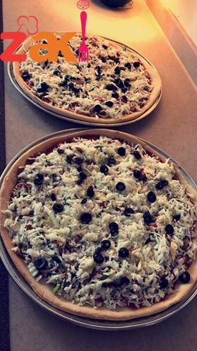 بيتزا روعة جداً والعجينة قطنية وخفيفة