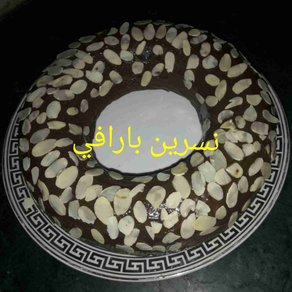 معكم صديقة زاكي الشيف نسرين بارافي كيكة الشوكولا المغلفة بالنوتيلا واللوز 