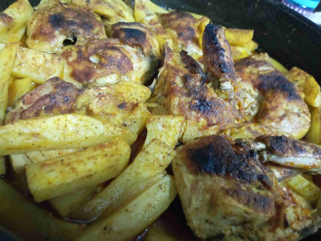 صنية دجاج مع بطاطا بالحامض 